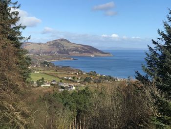 Scenic view of sea against blue sky