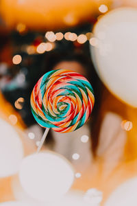 Close-up of multi colored candies on table