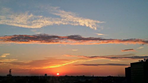 Scenic view of sunset over town