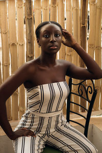 Portrait of beautiful young woman standing at home