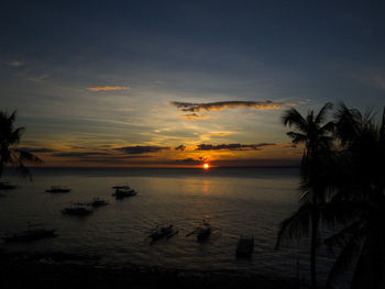 Scenic view of sea at sunset