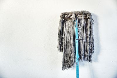 Close-up of clothes hanging on wall