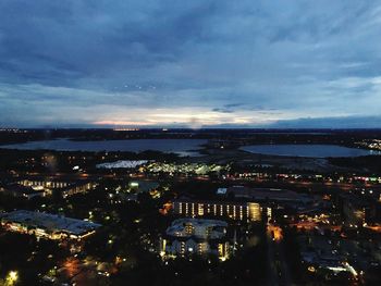 High angle view of illuminated buildings in city at night