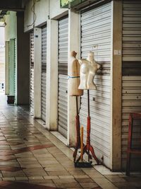 Full length of woman standing on street