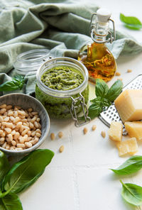 Fresh made pesto sauce. green basil pesto. ingredient for pesto sauce 