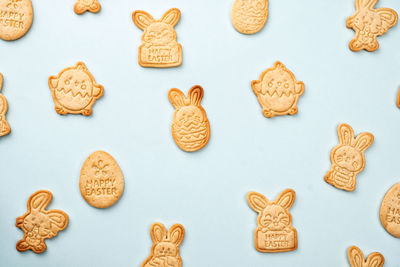 Directly above shot of gingerbread cookies on white background