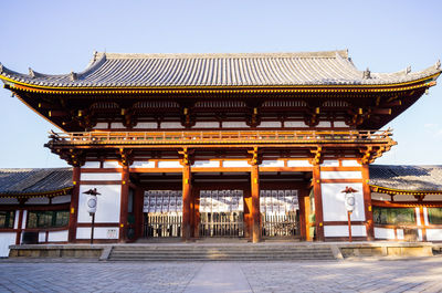 View of temple building against clear sky