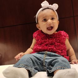 Portrait of cute girl sitting at home