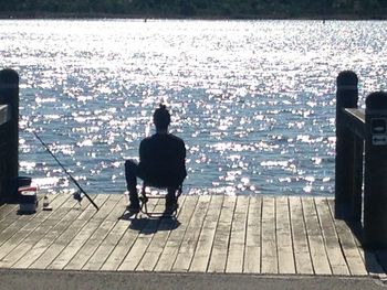 Reflection of woman in water