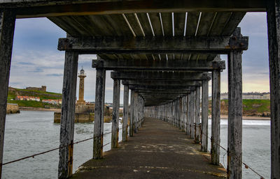 Wooden bridge over river