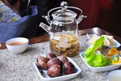 Close-up of fruits in bowl on table