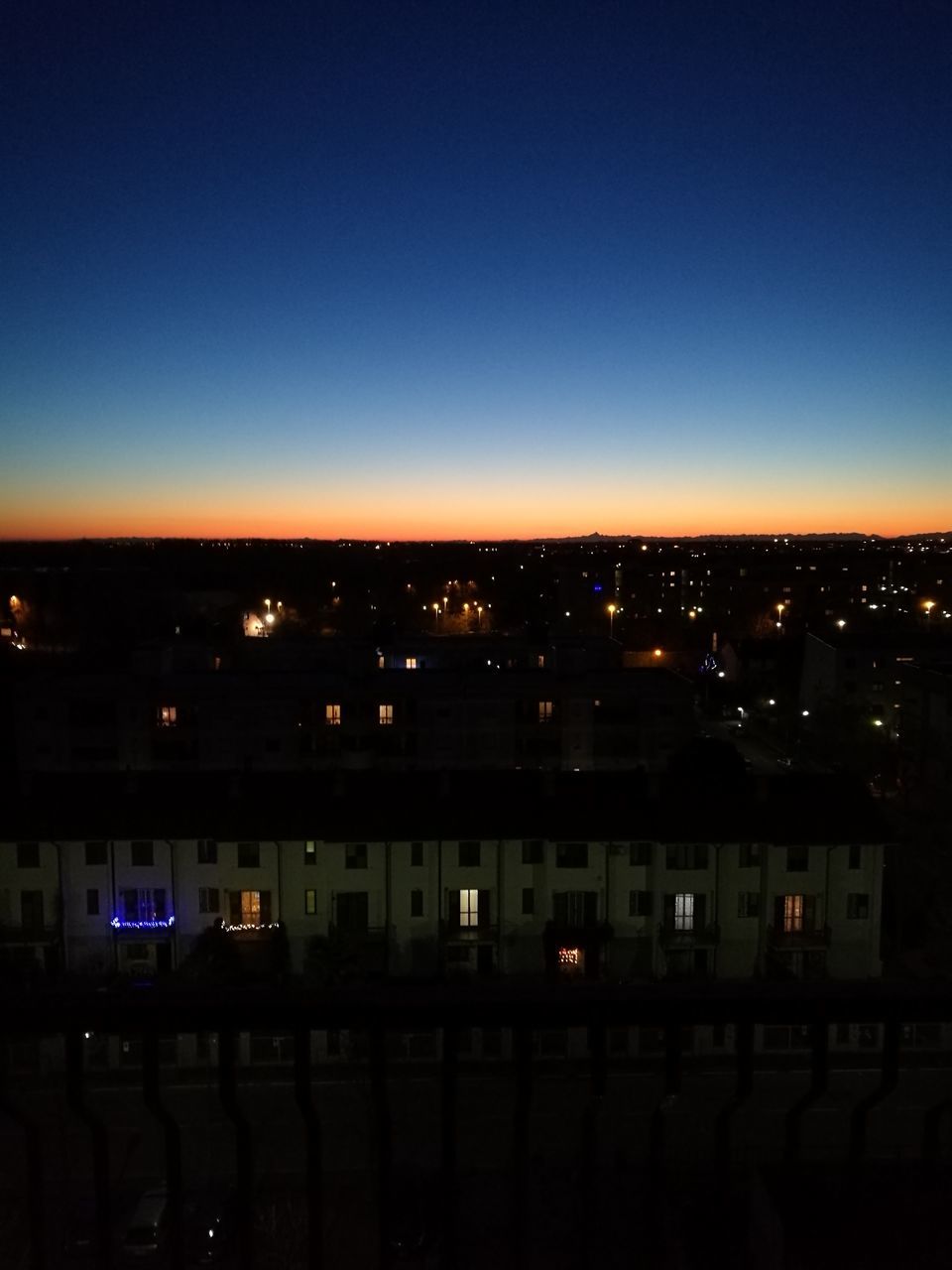 ILLUMINATED CITY AT NIGHT