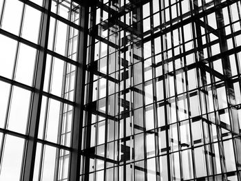 Low angle view of glass and iron building