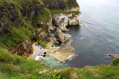 High angle view of rocks in sea