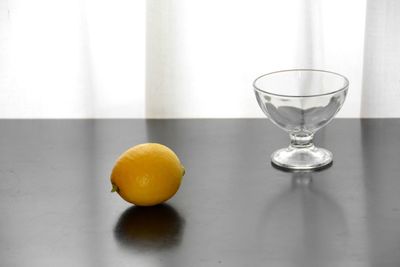 Close-up of cocktail in glass on table