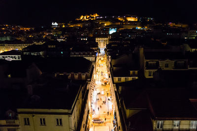 High angle view of illuminated buildings in city