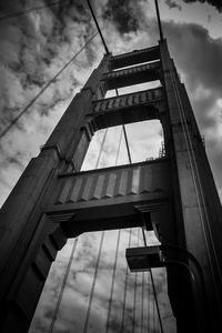 Low angle view of building against cloudy sky