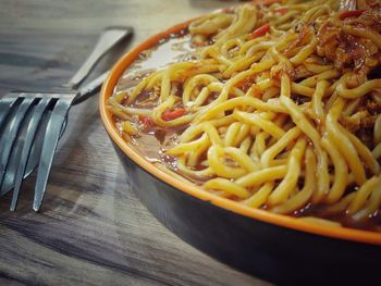 High angle view of noodles in plate on table