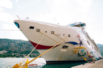 View of ship moored in sea against sky