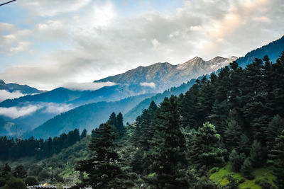 Scenic view of mountains against sky during winter