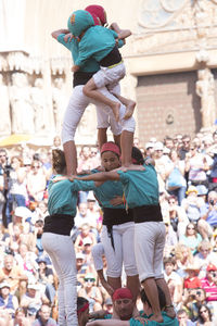 Group of people against the wall