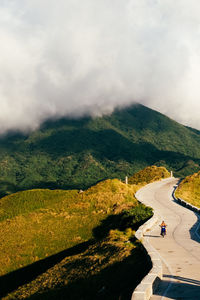 High angle view of road amidst landscape against sky