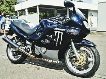 Close-up of motorcycle on street