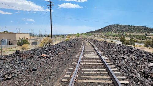 Railroad tracks against sky