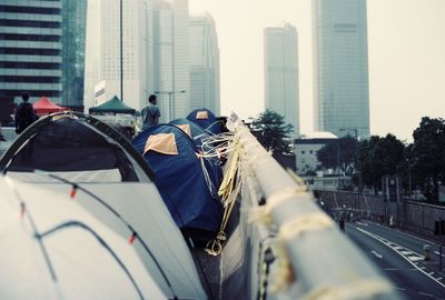 People on road in city