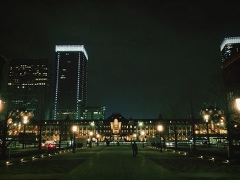 View of illuminated city at night