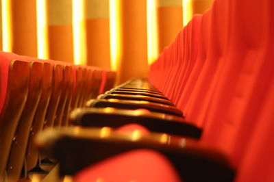 Close-up of empty chairs in movie theater