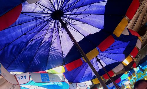 Low angle view of multi colored umbrella