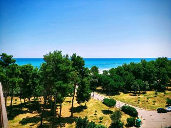 Scenic view of sea against clear blue sky