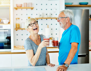 Full length of a smiling young woman