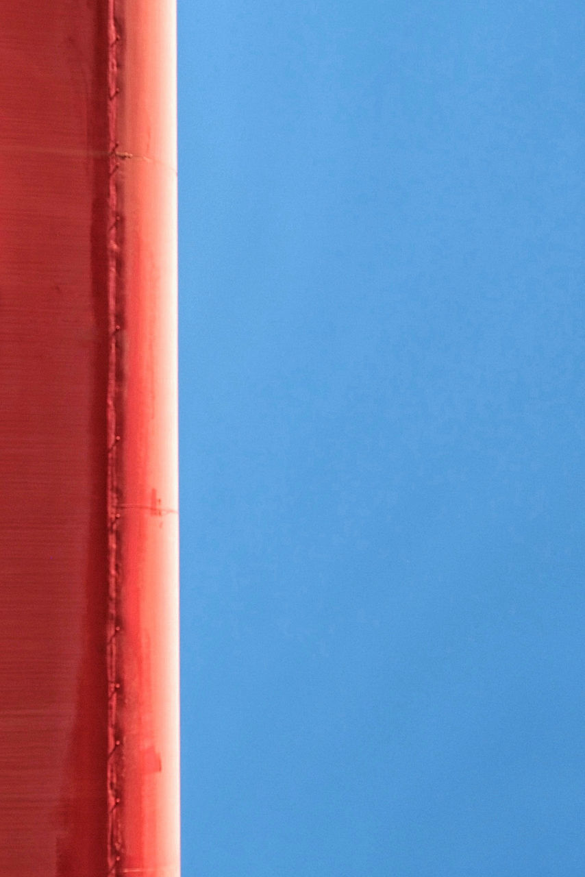 CLOSE UP OF RED BLUE BACKGROUND