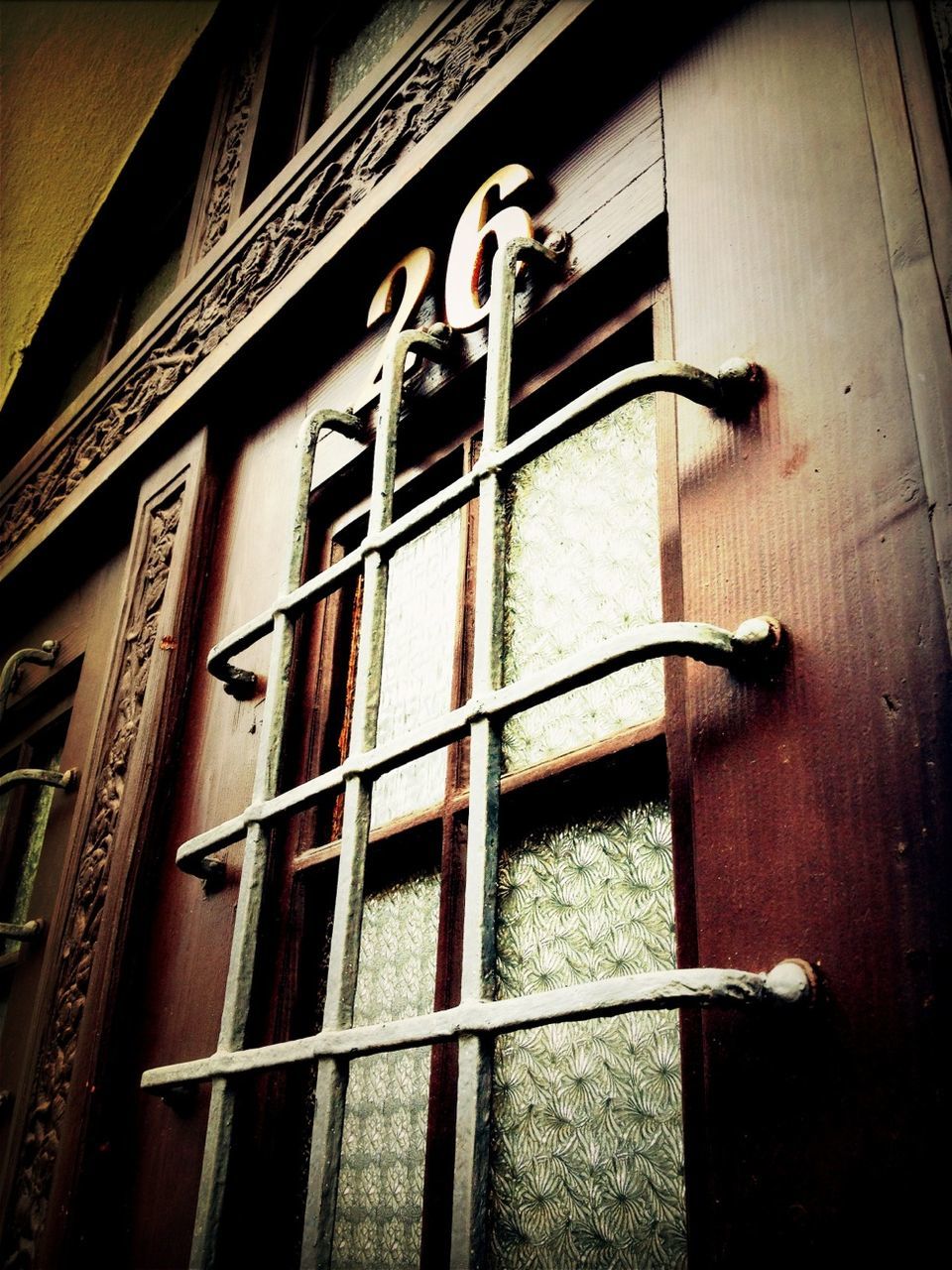 architecture, built structure, building exterior, indoors, metal, window, railing, low angle view, close-up, wood - material, no people, building, wall - building feature, night, metallic, steps, staircase, pattern, closed