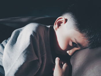 Close-up of young woman with eyes closed