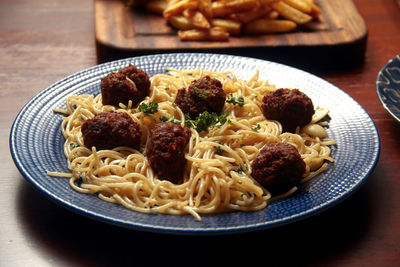 Close-up of noodles served in plate