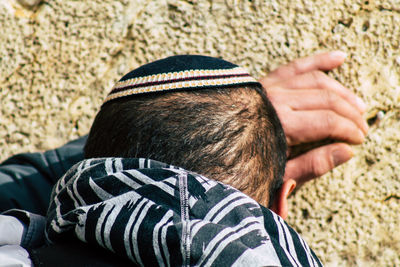 Rear view of man wearing hat