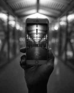 People in illuminated tunnel