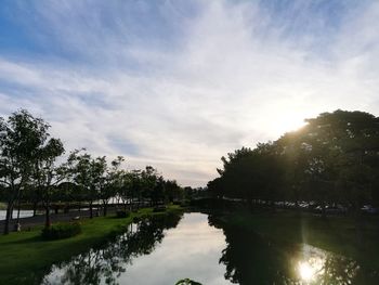 Scenic view of lake against sky during sunset