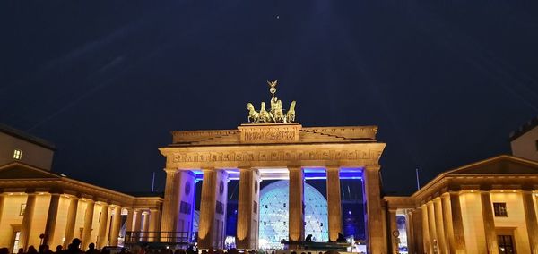 Low angle view of statue at night