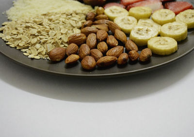 Various food in plate on white background