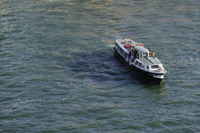 High angle view of boat sailing in sea