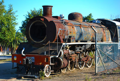 Rusted train on railroad track