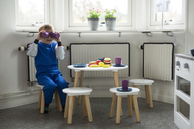 Boy playing with cups