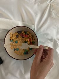 High angle view of man holding food
