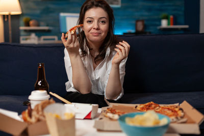 Young woman sitting at restaurant