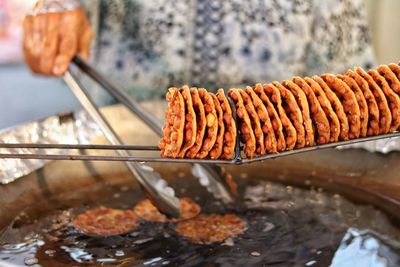 Close-up of meat on barbecue grill