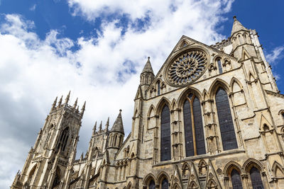 Low angle view of york minster against sky
